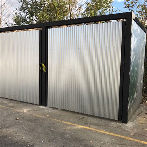 metal frame topped trash enclosure|roof secured garbage enclosures.